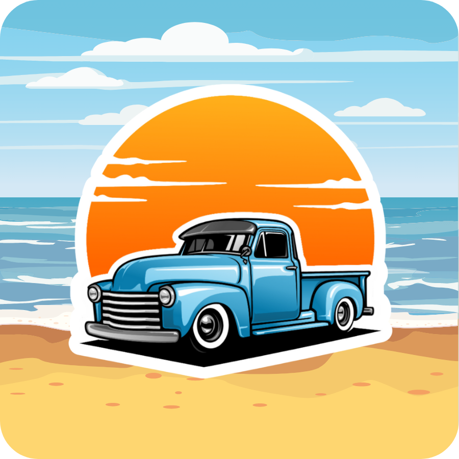 Die cut sticker of a vintage blue pickup truck parked on a beach, with a bright orange sun setting over the ocean and a calm blue sky overhead.