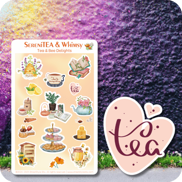 Sticker sheet featuring cozy tea-themed illustrations like teapots, bees, honey jars, books, and pastries. The scene is set against a soft purple and gold spray-painted wall. A large die-cut pink heart with the word “tea” written in script is placed next to the sheet.
