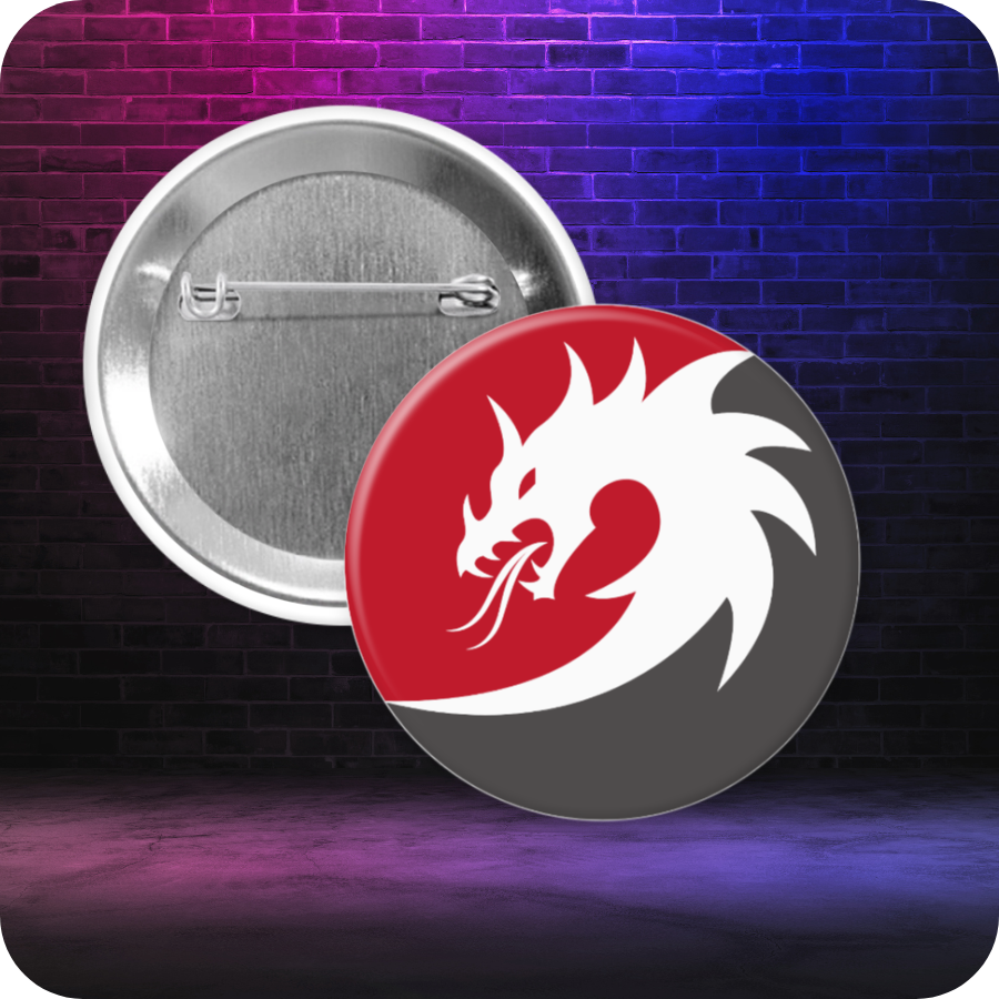 Round button with a bold white dragon design on a red and black background, displayed in front of a purple-blue brick wall.