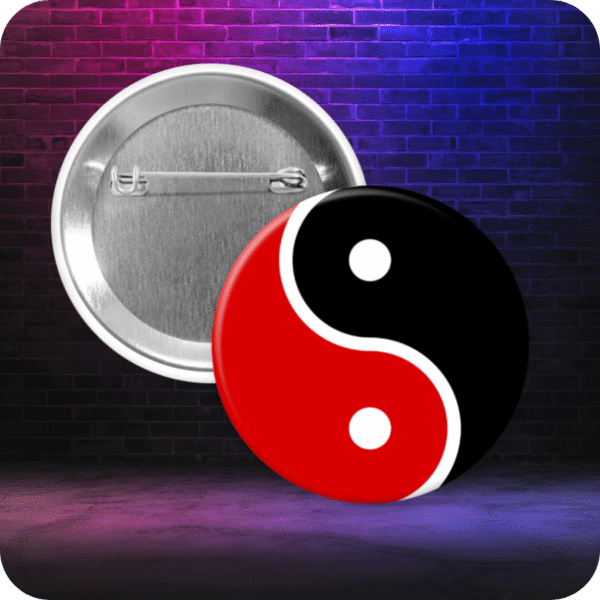 Pinback button featuring a red and black yin-yang design, separated with white, with two white dots. Button is displayed with metal backing on a gradient graffiti-style background.